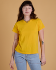Alex is 5’8” and wearing P Organic Vintage Tee in Sunshine Yellow
