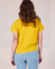 Organic Vintage Tee in Golden Yellow back view on Alex