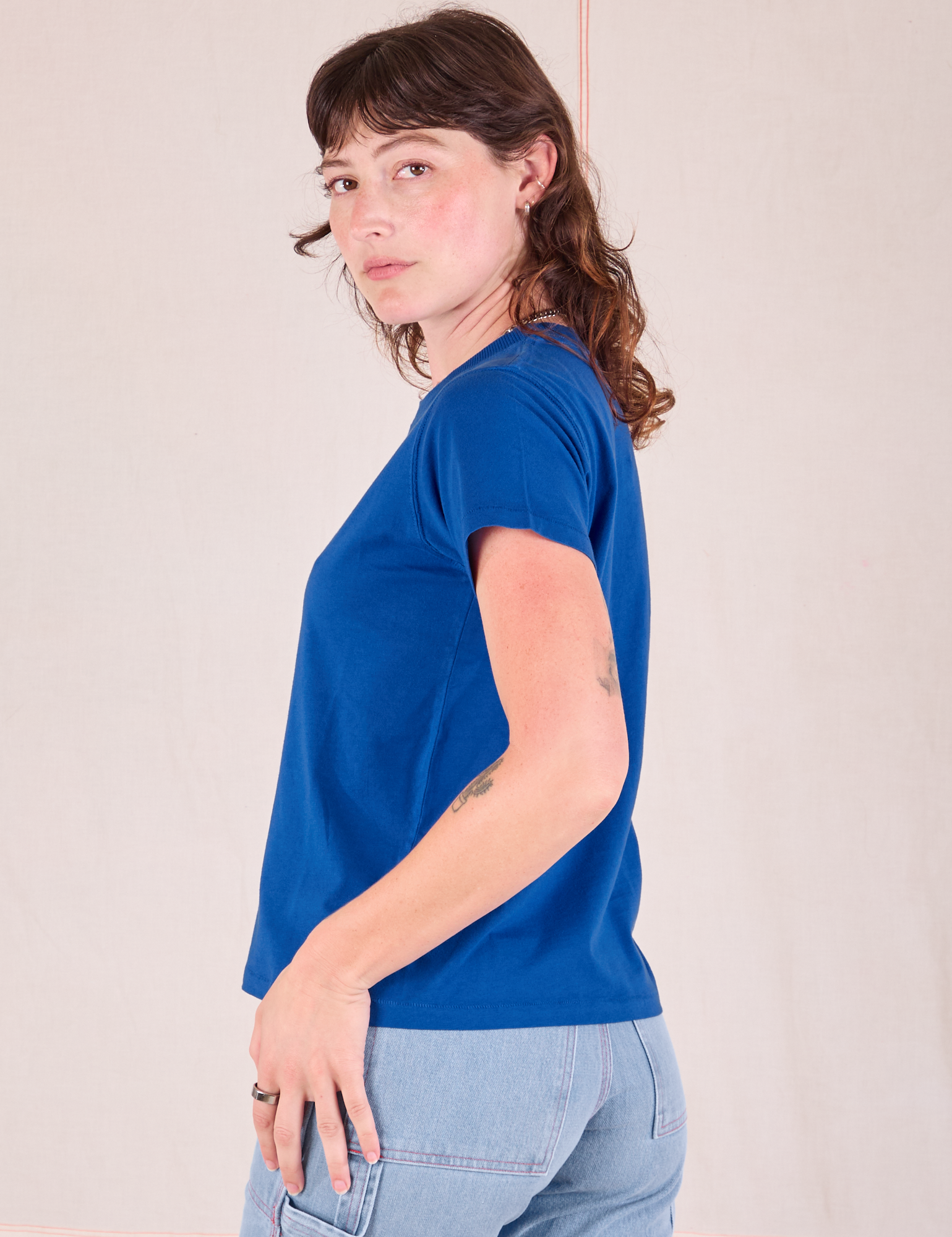 Organic Vintage Tee in Royal Blue side view on Alex