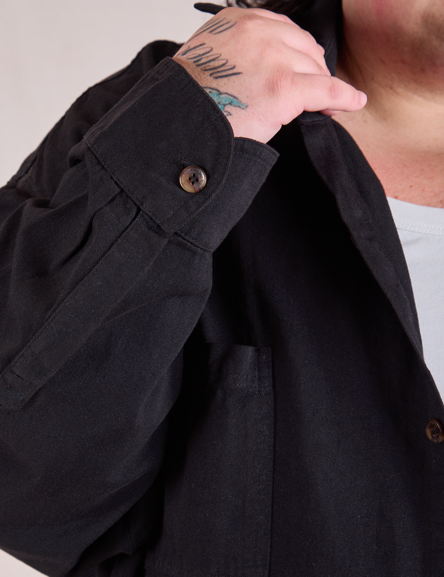 Twill Overshirt in Basic Black sleeve close up on Sam