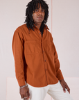 Angled front view of Twill Overshirt in Burnt Terracotta on Jerrod