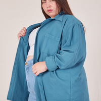 Side view of Oversize Overshirt in Marine Blue worn by Marielena