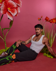Paintstamped Work Pants in Poppy and Cropped Tank in Vintage Tee White worn by Jesse