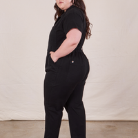 Petite Short Sleeve Jumpsuit in Basic Black side view worn by Ashley