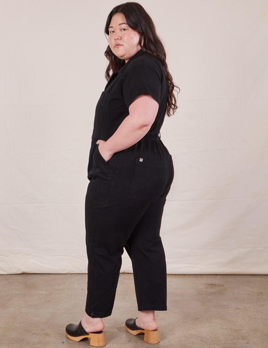 Petite Short Sleeve Jumpsuit in Basic Black side view worn by Ashley