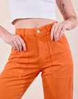 Work Pants in Construction Orange front close up on Alex