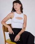 Alex is wearing the Vintage Tee White Porthole Tank