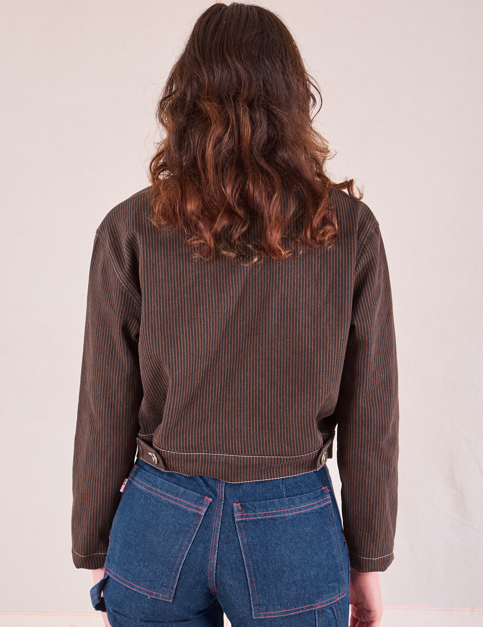 Mechanic Jacket in Fudgesicle Brown back view on Alex