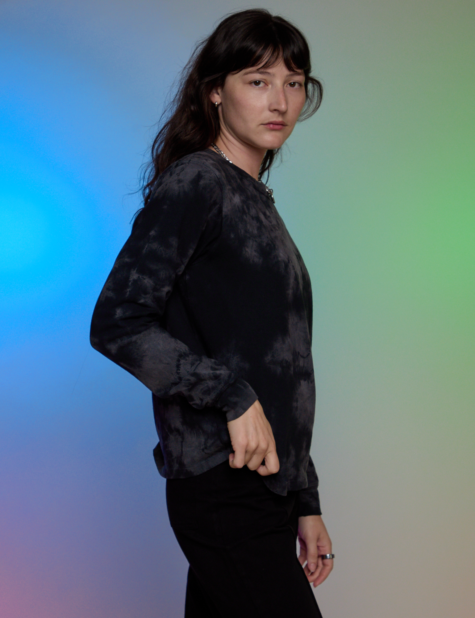 Magic Waters Long Sleeve Burly Tee in Black side view on Alex