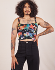 Jesse is 5'8" and wearing XS Cropped Cami in Rainbow Magic Waters paired with black Western Pants