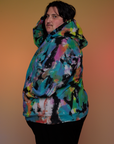 Oversized Hoodie in Rainbow Magic Waters side view on Sam