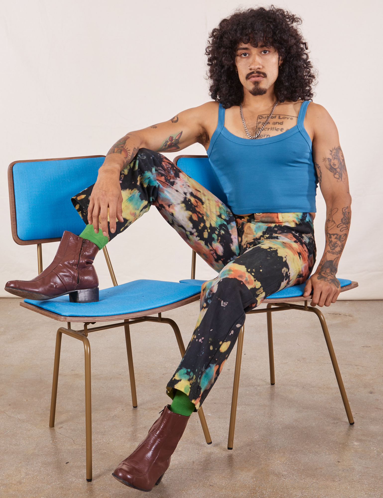 Jesse is wearing Rainbow Magic Waters Work Pants and marine blue Cropped Cami