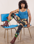 Jesse is wearing Rainbow Magic Waters Work Pants and marine blue Cropped Cami