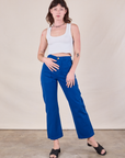 Alex is 5'8" and wearing XS Work Pants in Royal Blue paired with a Cropped Tank in Vintage Tee Off-White