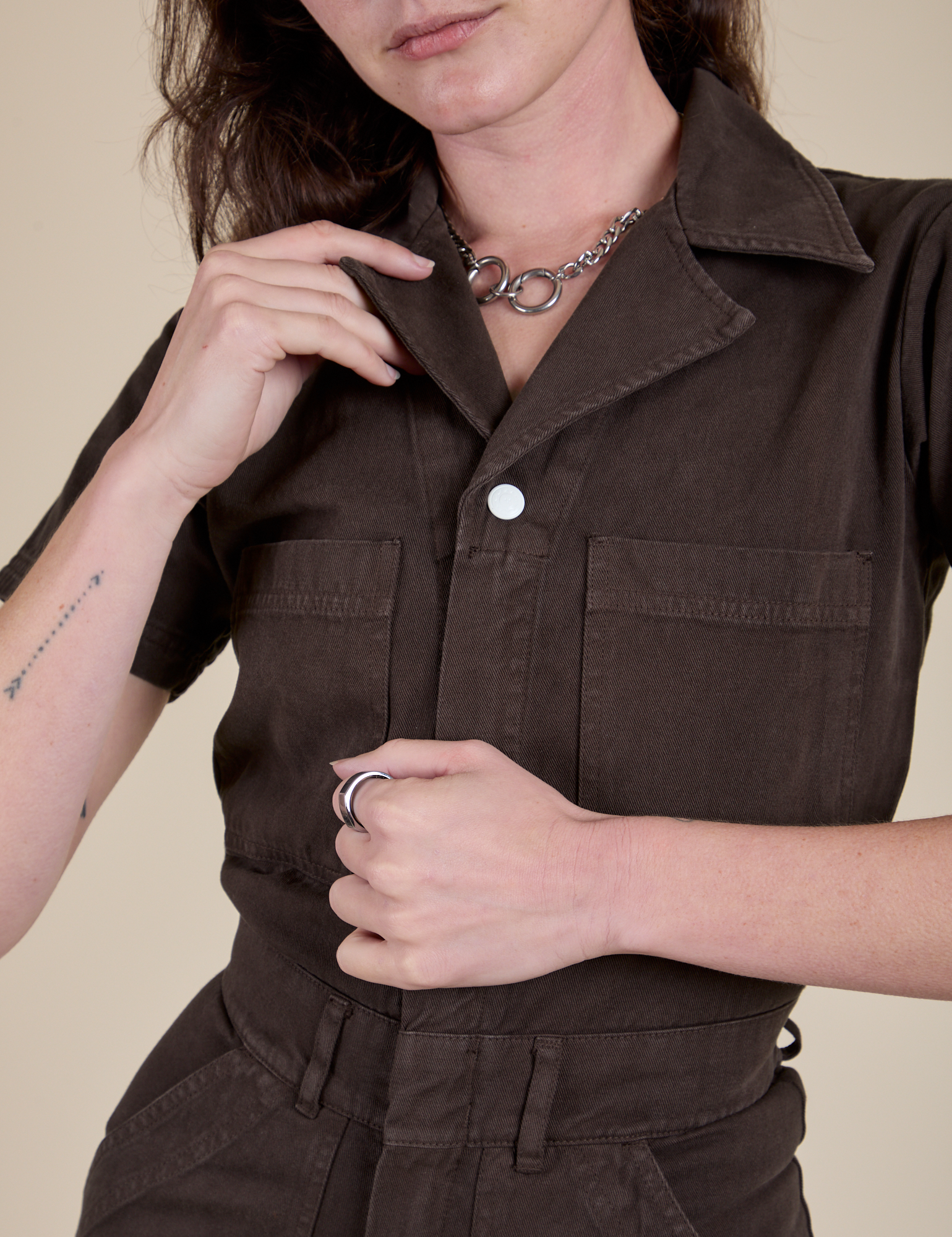 Front close up of Short Sleeve Jumpsuit in Espresso Brown on Alex