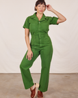 Tiara is 5'4" and wearing S Short Sleeve Jumpsuit in Lawn Green