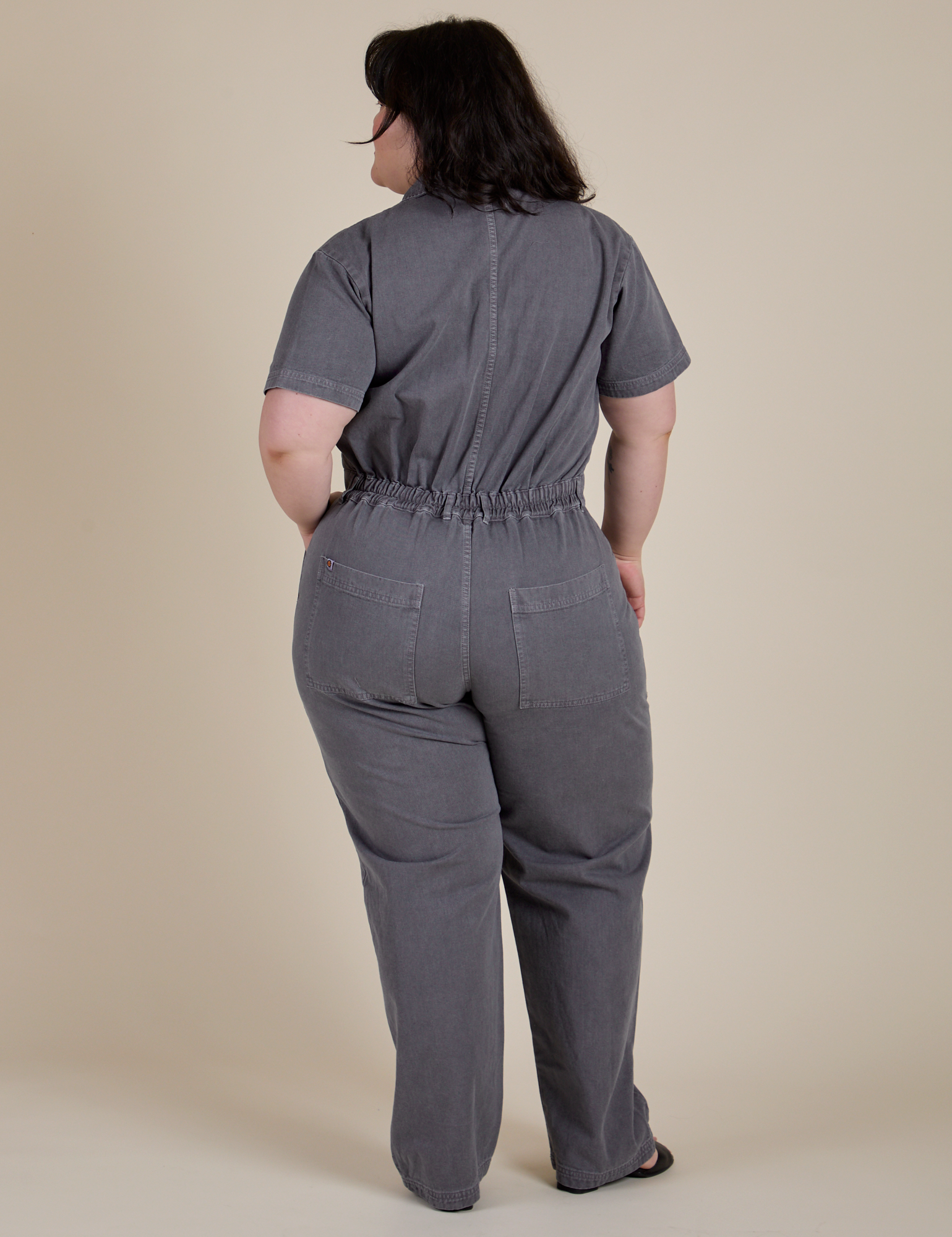 Short Sleeve Jumpsuit in Washed Grey back view on Ashley