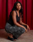 Kandia is wearing Work Pants in Spiderwebs and black Cropped Tank