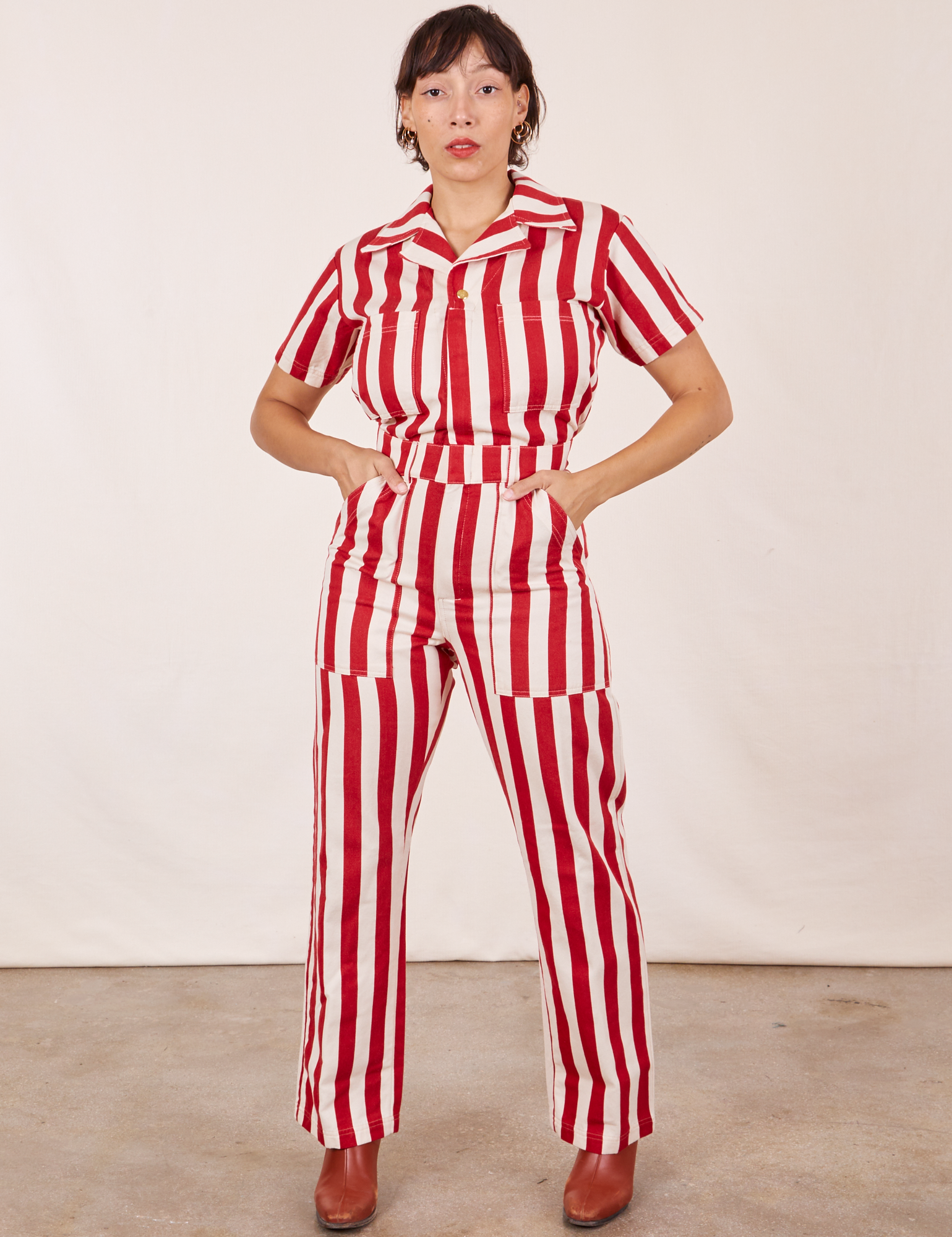Tiara is 5&#39;4&quot; and wearing XS Cherry Stripe Jumpsuit