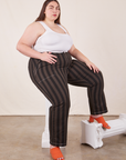 Marielena is wearing Black Striped Work Pants in Espresso and vintage off-white Cropped Tank Top