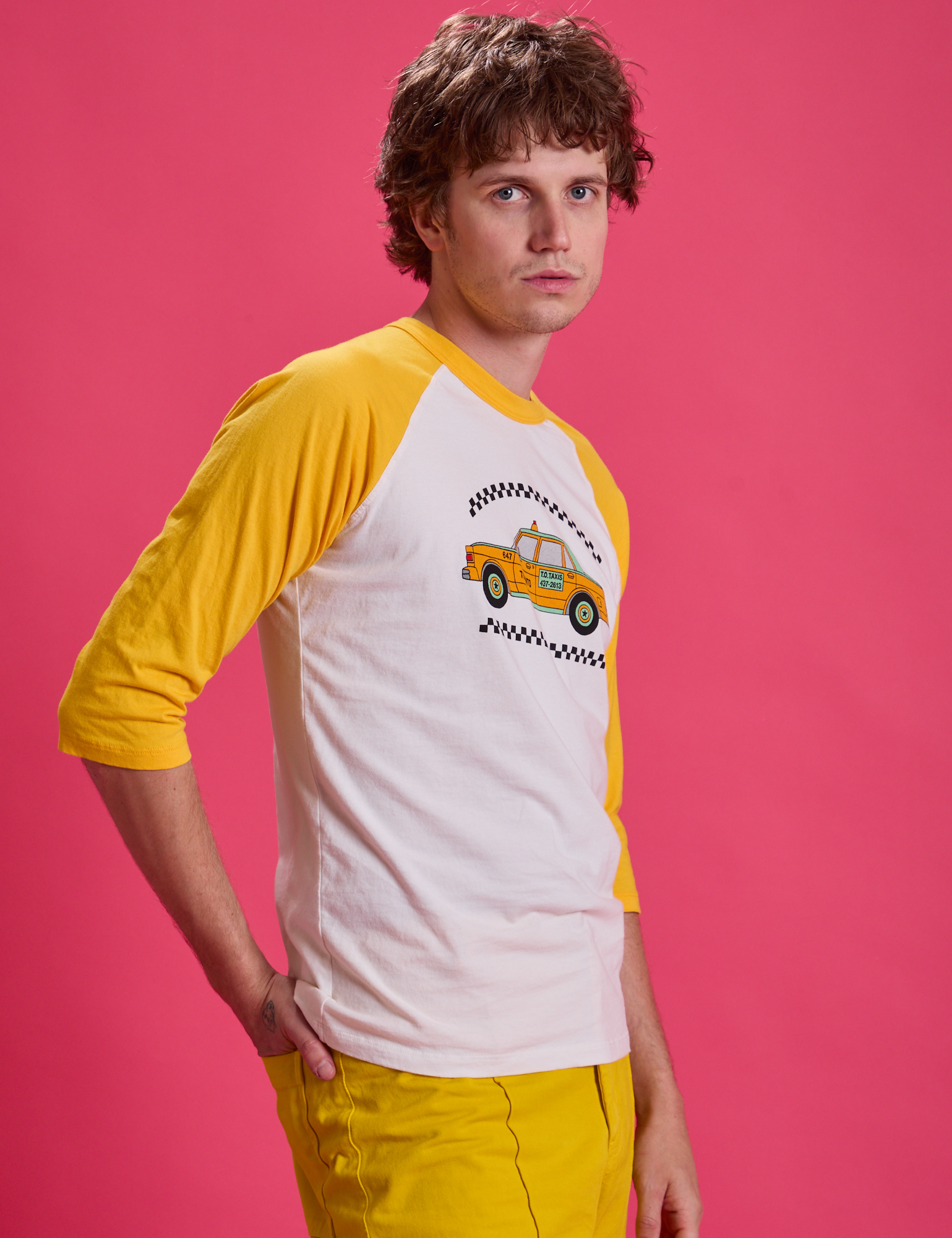 Taxi Raglan Tee in Toronto side view on Quinn