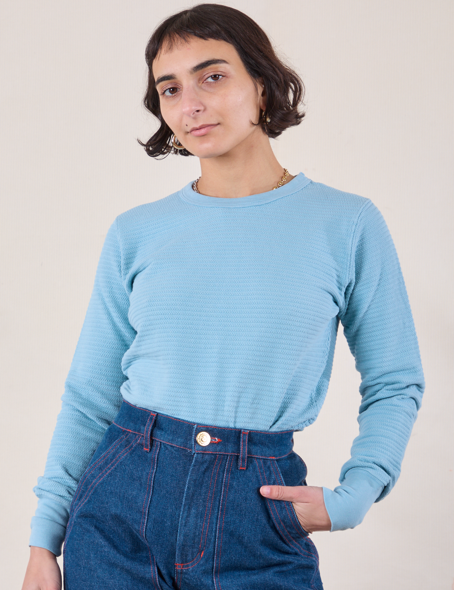 Soraya is 5&#39;3&quot; and wearing P Honeycomb Thermal in Baby Blue