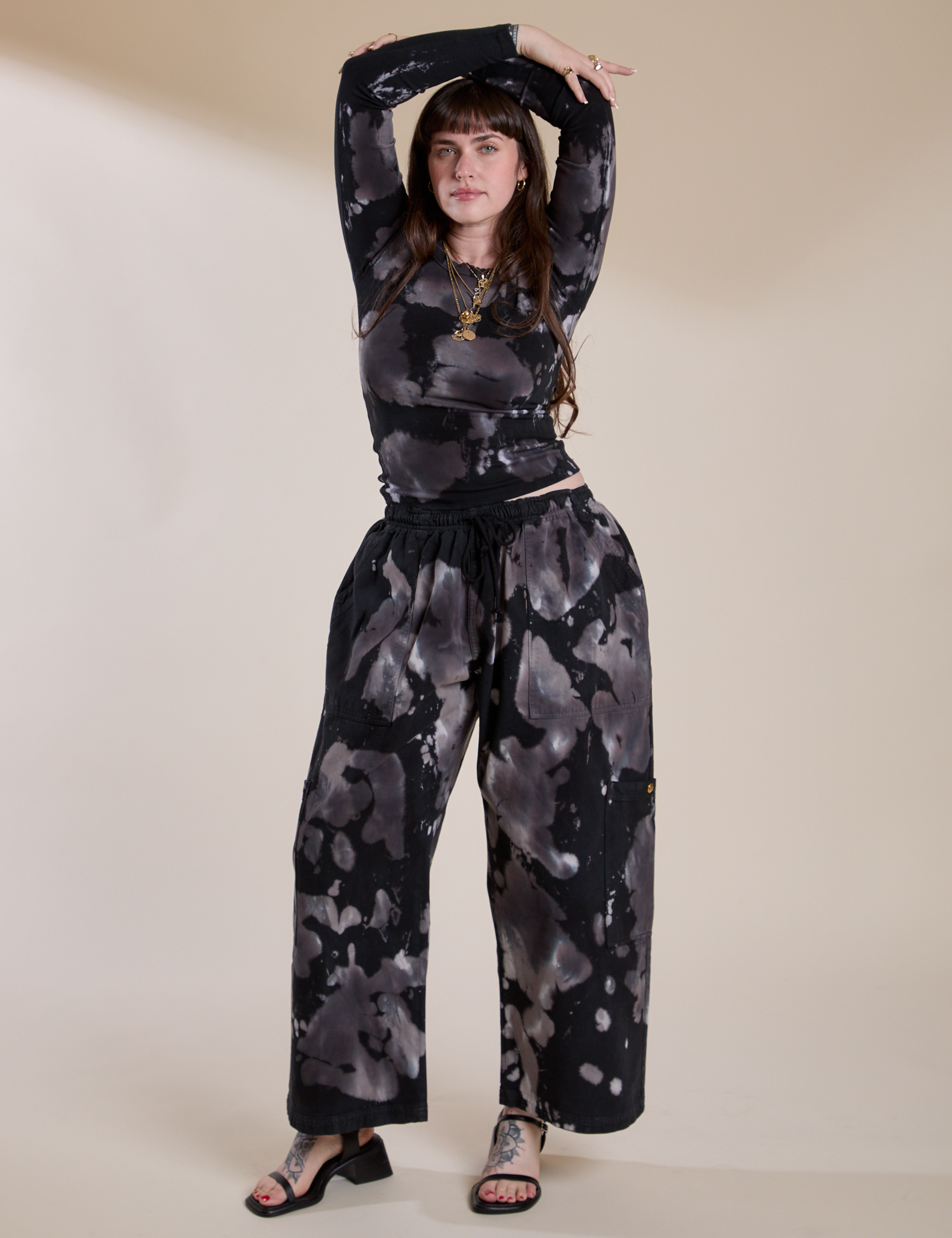 Sydney is wearing Long Sleeve Baby Tee in Ink Blot and matching Drop Pocket Cargo Pants