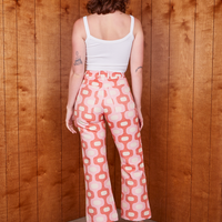 Back view of Western Pants in Pink Jacquard worn by Alex