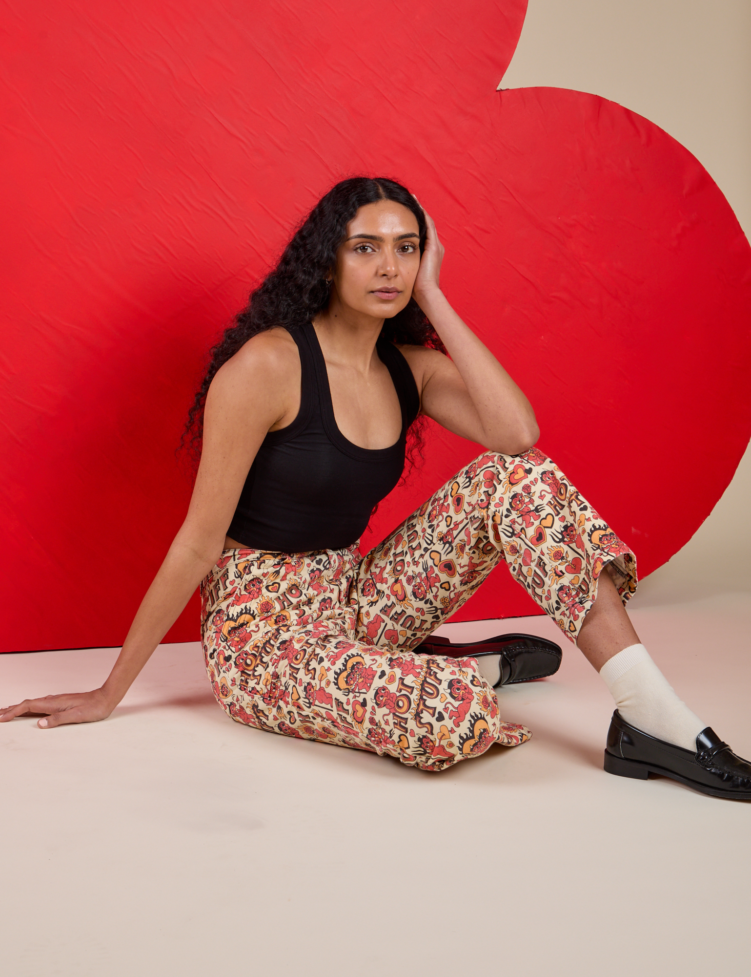 Work Pants in Hot Stuff Print and black Cropped Tank worn by Shahana