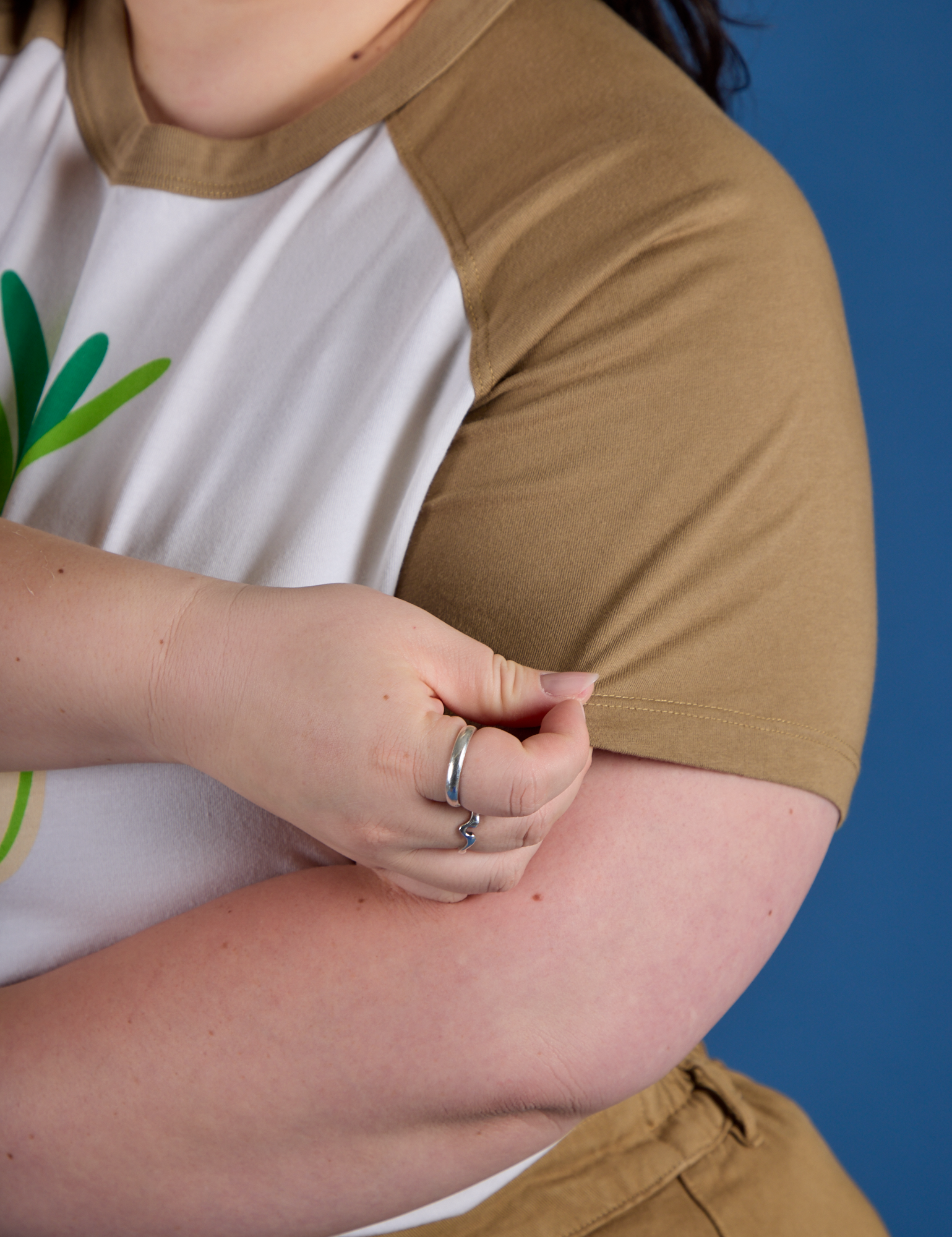 Produce Raglan Tee in Onion sleeve close up on Ashley