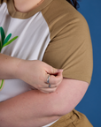 Produce Raglan Tee in Onion sleeve close up on Ashley