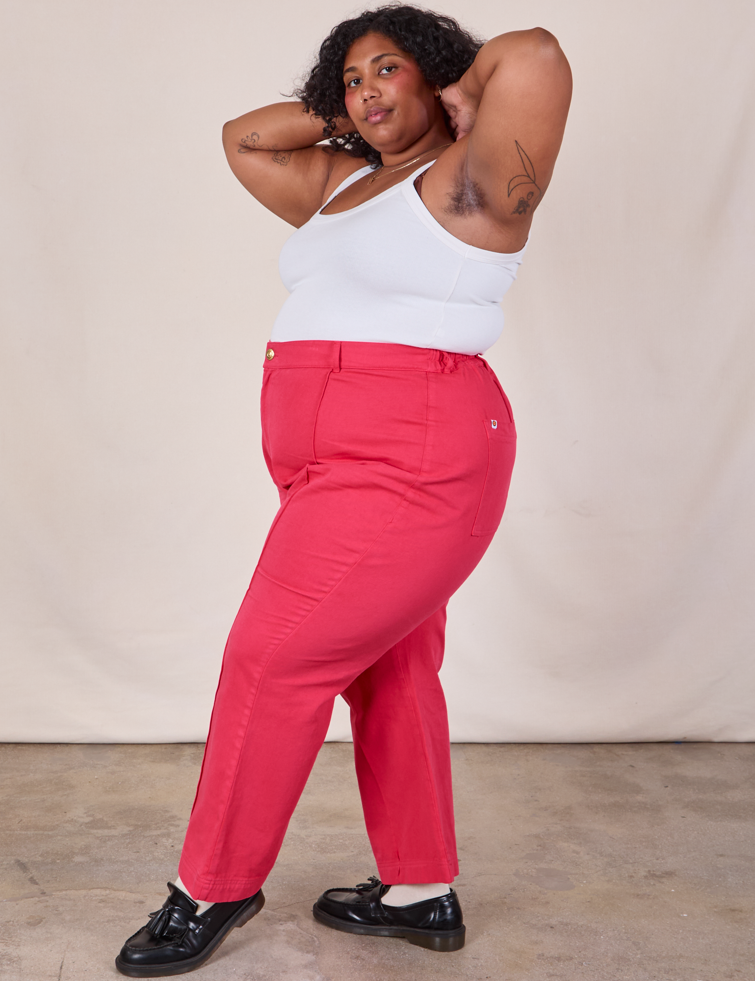 Side view of Western Pants in Hot Pink and Cropped Cami in Vintage Tee Off-White on Morgan