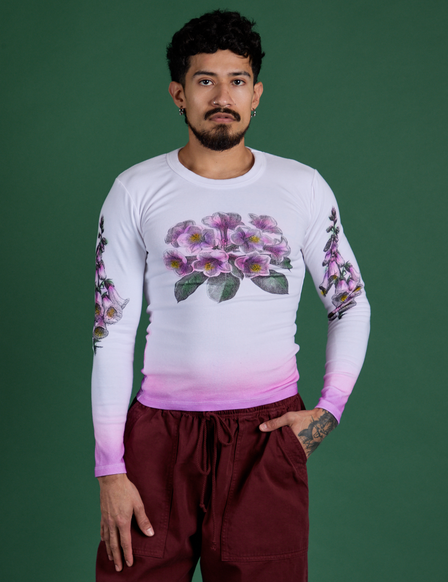 Jesse is 5’7” and wearing S Floral Long Sleeve Baby Tee in Pink