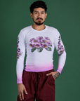 Jesse is 5’7” and wearing S Floral Long Sleeve Baby Tee in Pink