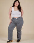 Ashley is wearing Work Pants in Washed Grey and Cropped Tank in Vintage Tee White