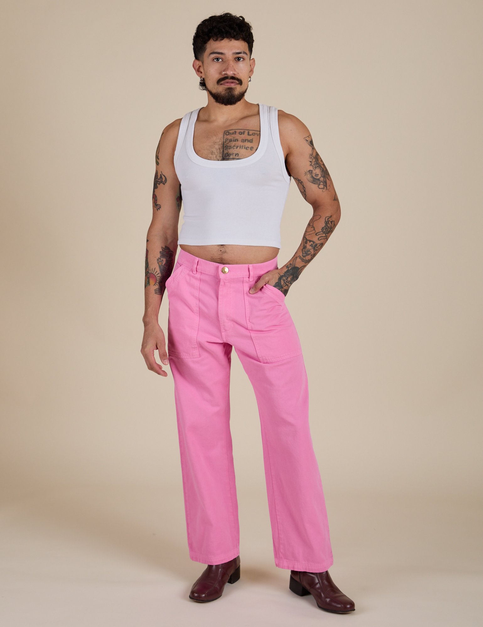 Jesse is 5’8” and wearing S Work Pants in Bubblegum Pink paired with vintage tee white Cropped Tank