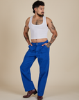 Jesse is 5’8” and wearing S Work Pants in Royal Blue paired with a vintage tee white Cropped Tank