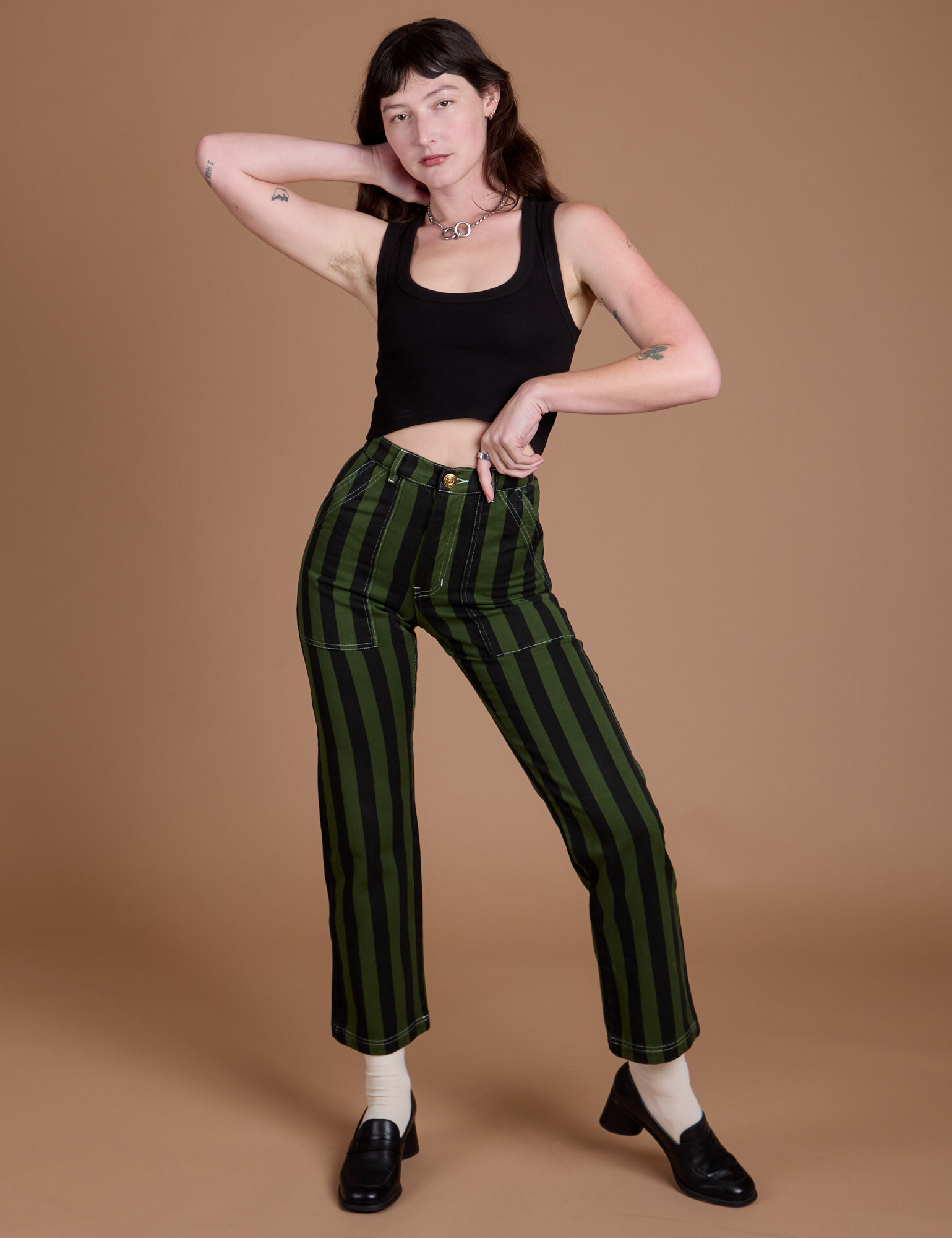Alex is 5’8” and wearing XXS Black Stripe Work Pants in Evergreen