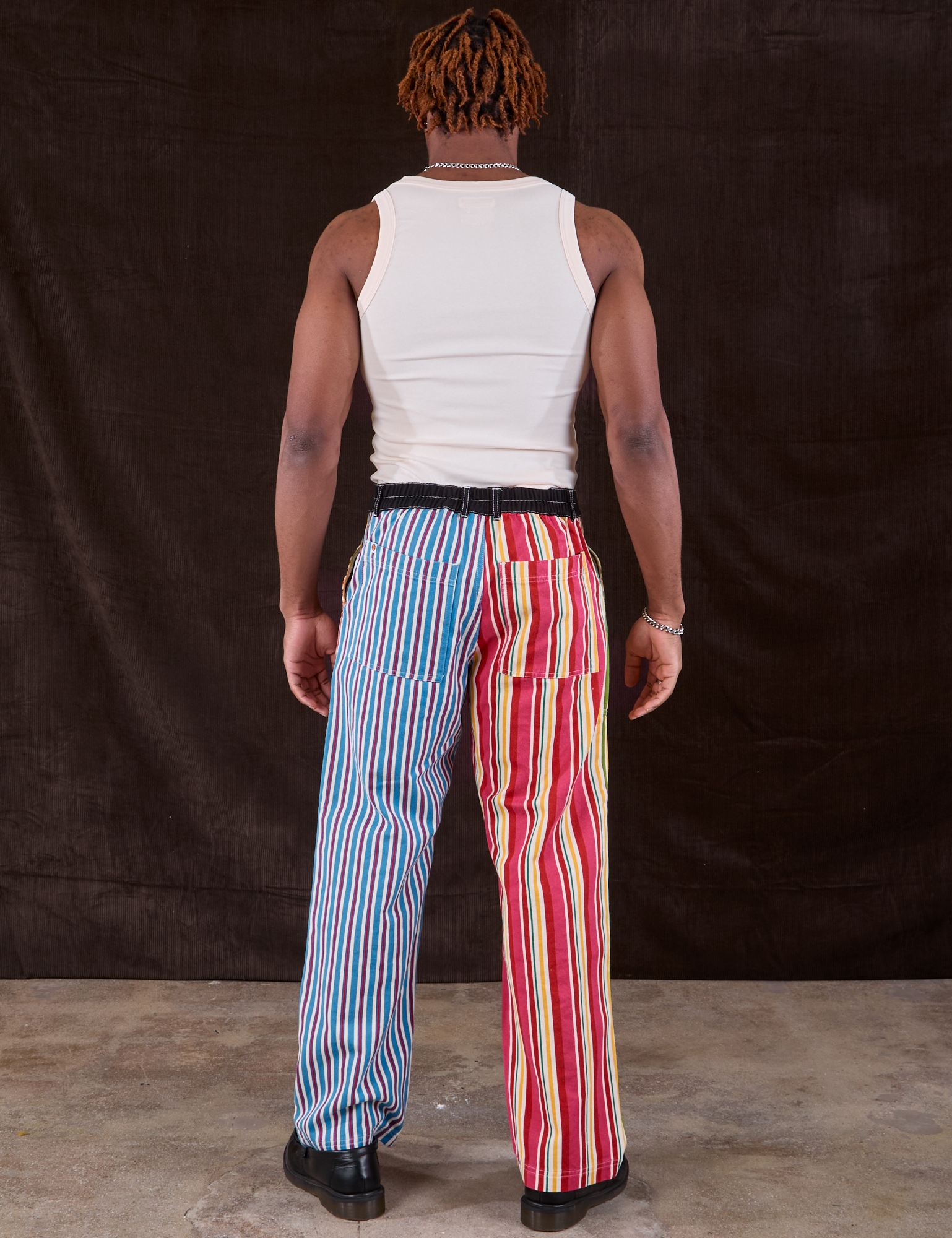 Back view of Mixed Stripe Work Pants and Tank Top in vintage tee off-white on Isaac