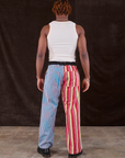 Back view of Mixed Stripe Work Pants and Tank Top in vintage tee off-white on Isaac