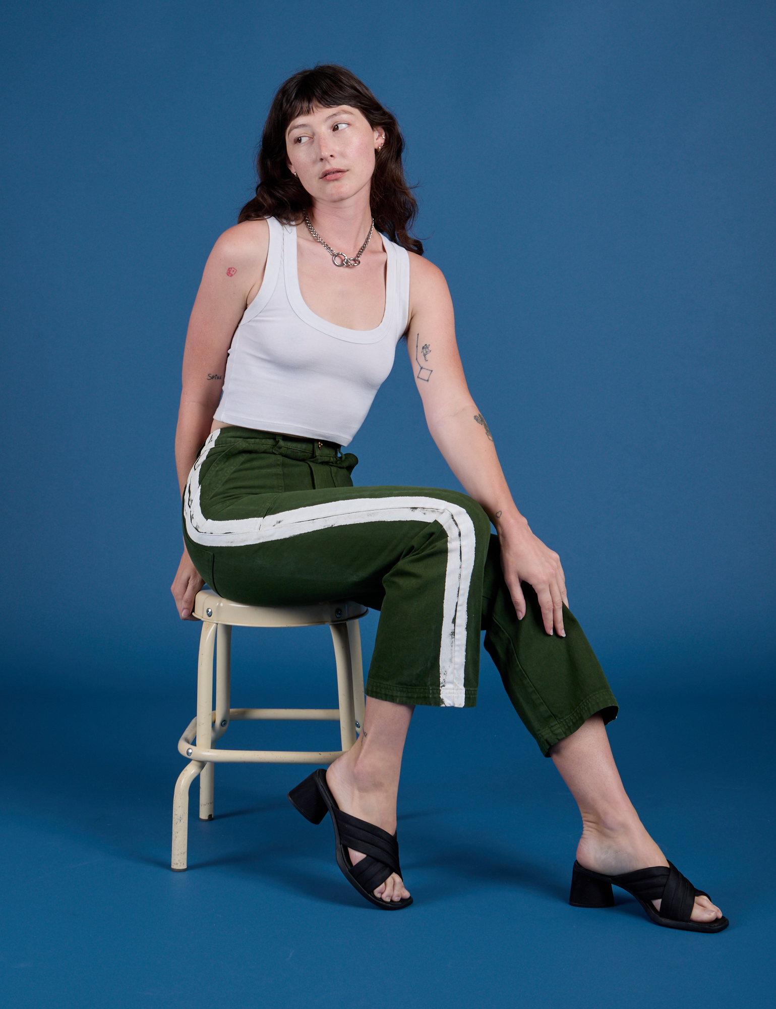 Painted Work Pants in Evergreen and Cropped Tank in Vintage Tee White on Alex