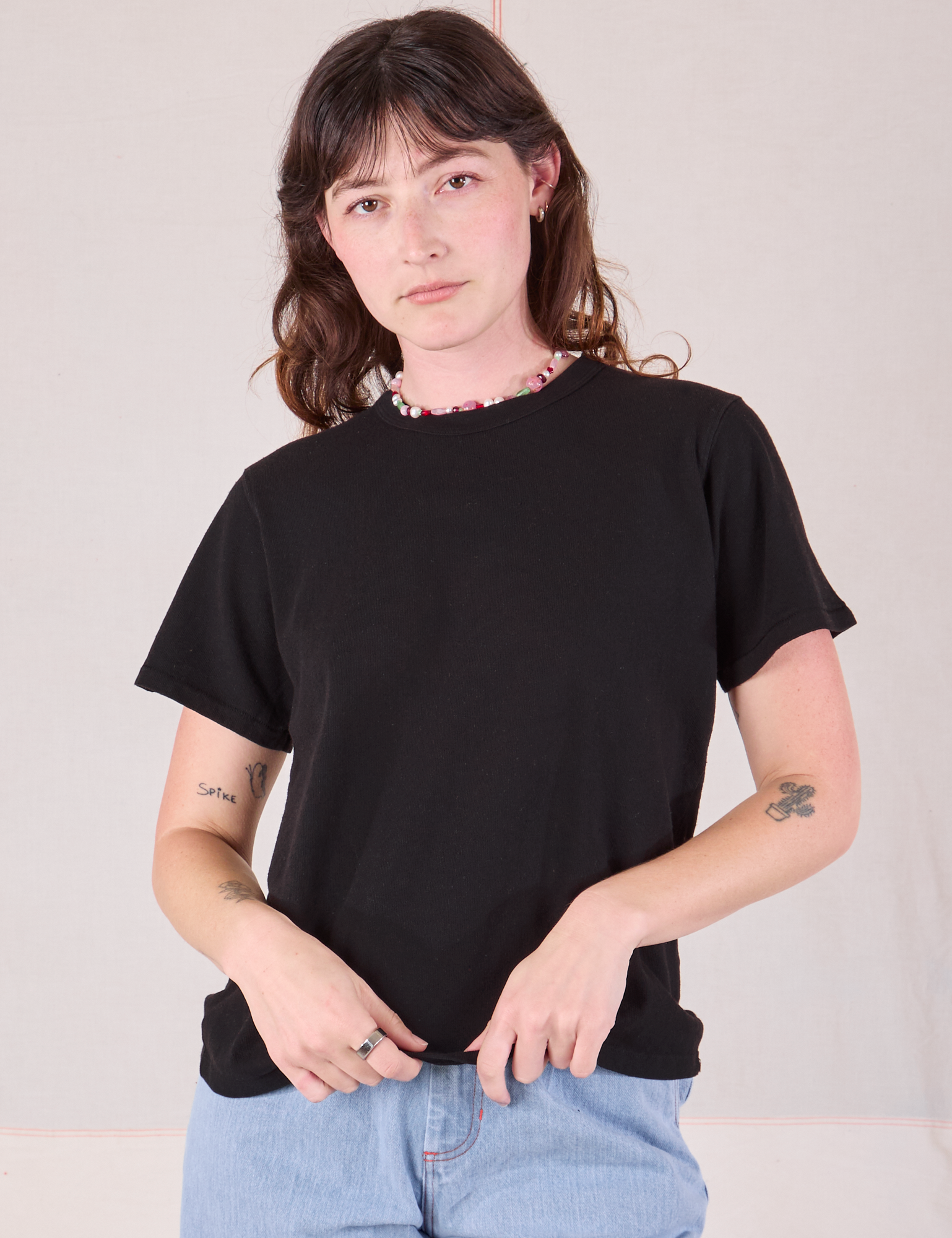 Alex is 5&#39;8&quot; and wearing P Burly Tee in Basic Black