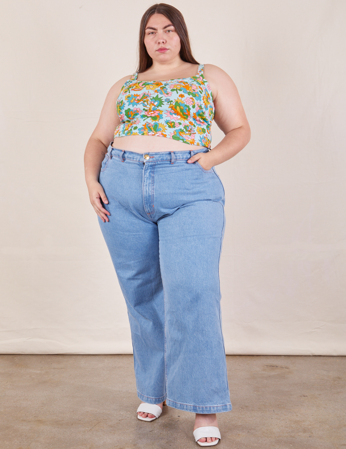 Marielena is wearing Butterfly Bash Cami and light wash Sailor Jeans