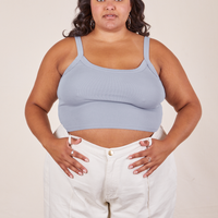 Alicia is 5'9" and wearing XL Cropped Cami in Periwinkle worn by vintage off-white Western Pants
