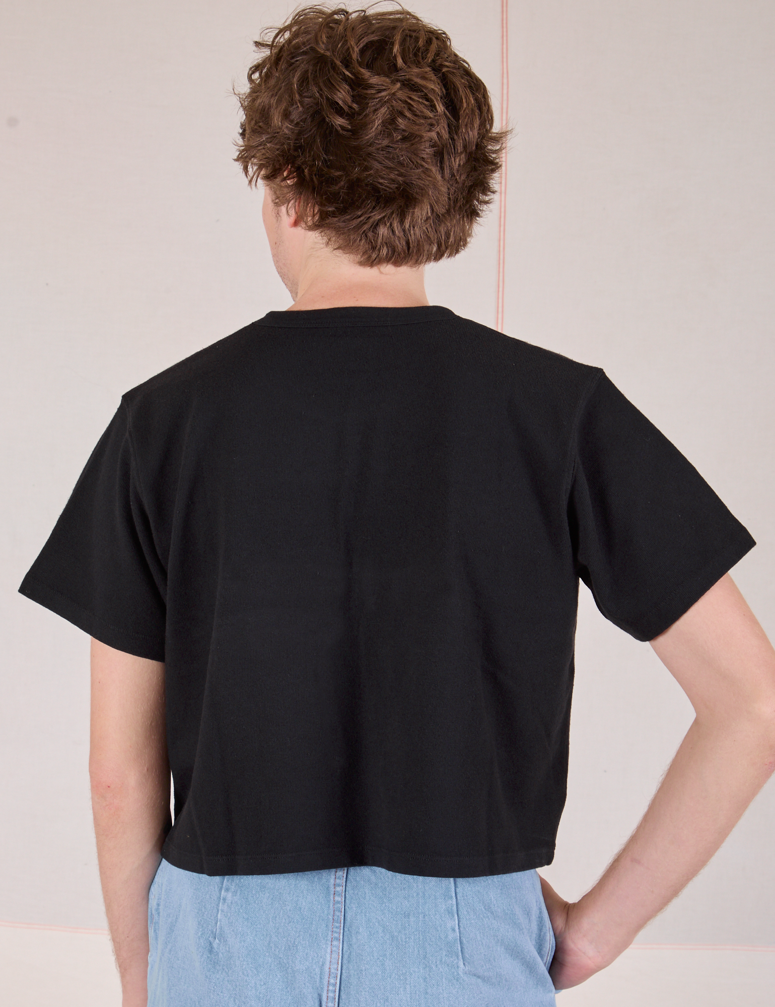 Cropped Burly Tee in Basic Black back view on Quinn