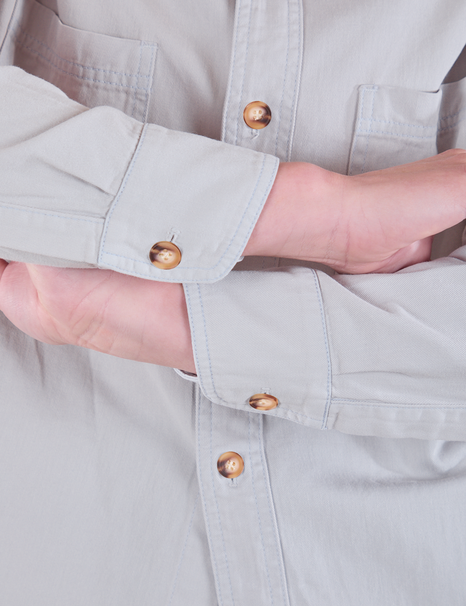 Cropped Overshirt in Stone White sleeve cuff close up on Alex