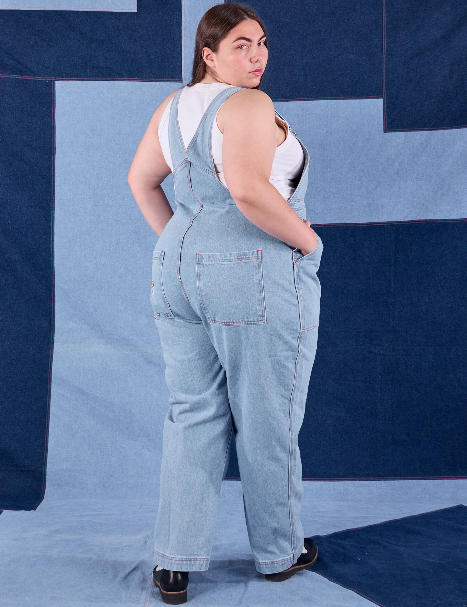 Indigo Denim Original Overalls in Light Wash angled back view on Marielena