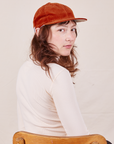 Dugout Corduroy Hat in Burnt Terracotta worn by Alex