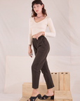 Side view of Easy Pants in Espresso Brown and vintage tee off-white Long Sleeve V-Neck Tee