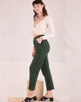 Side view of Easy Pants in Swamp Green and vintage tee off-white Wrap Top